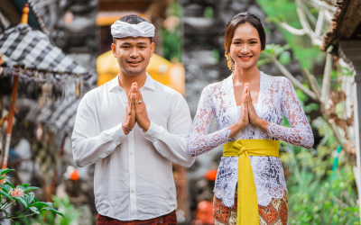 Balinese man and women greeting